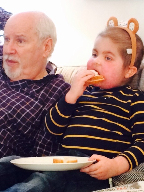 Eating bacon butties with Papa after the hub visit this week.& on Children In Need Day (hence the ears!!!)